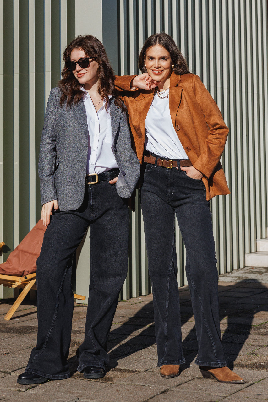 Model wearing black Angelozi wide leg palazzo jeans